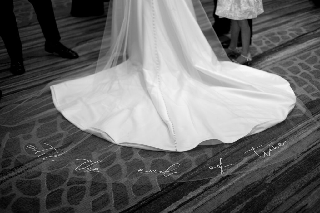 Custom engraved veil by Sara Gabriel Veils during a wedding at The Ritz-Carlton Resort in Naples, Florida. 
